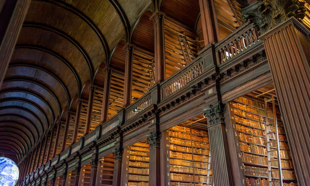 Wooden archive room filled with old bound documents and ledgers